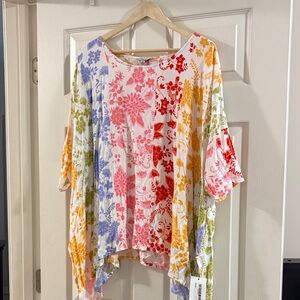 NWT! Beautiful flowy blouse.